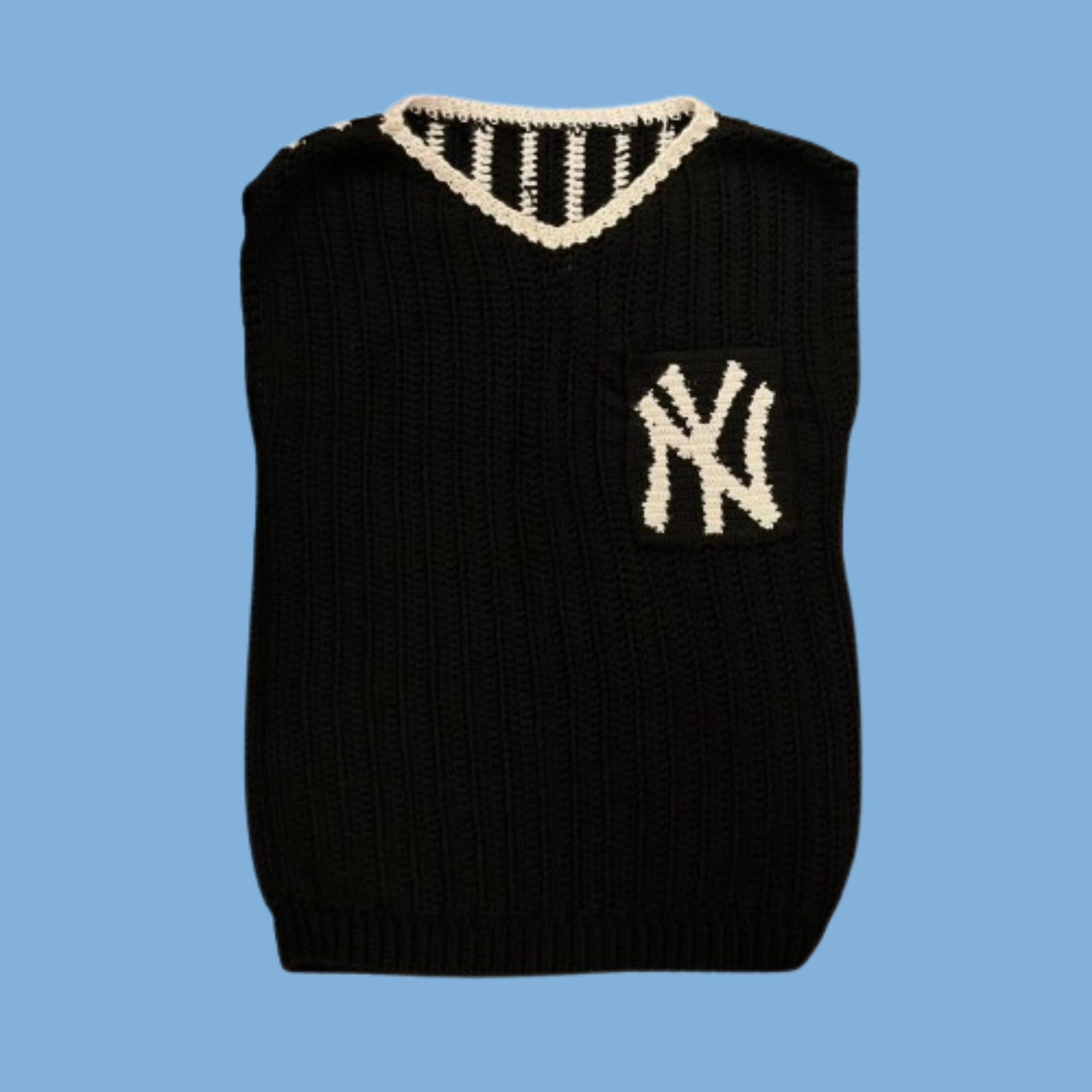Black knitted vest with a logo on a blue background